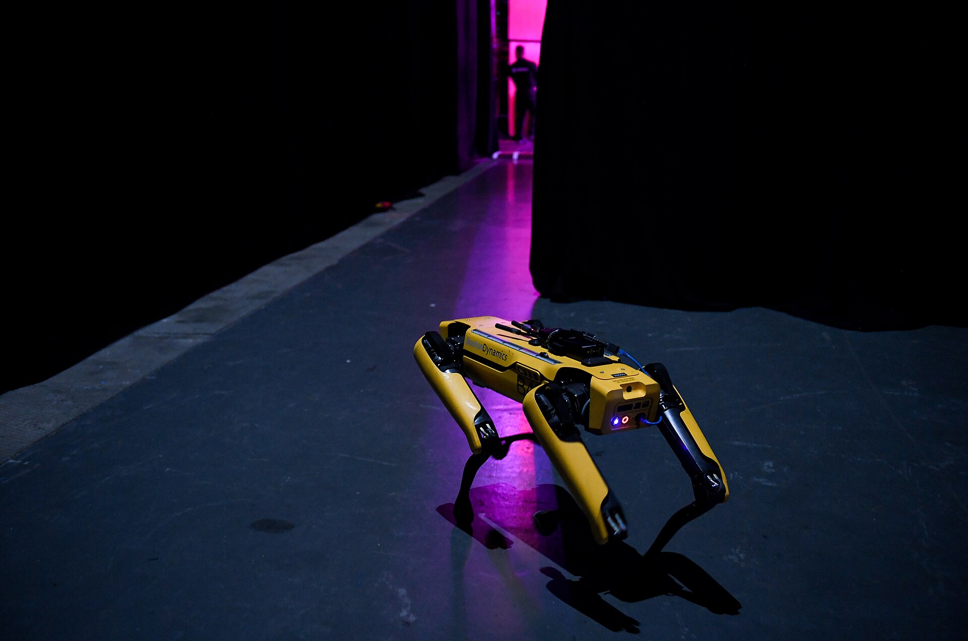 File photo: Boston Dynamics’ SpotMini at Web Summit 2019. Illustrative context for quadruped robots; not an Asylon deployment.